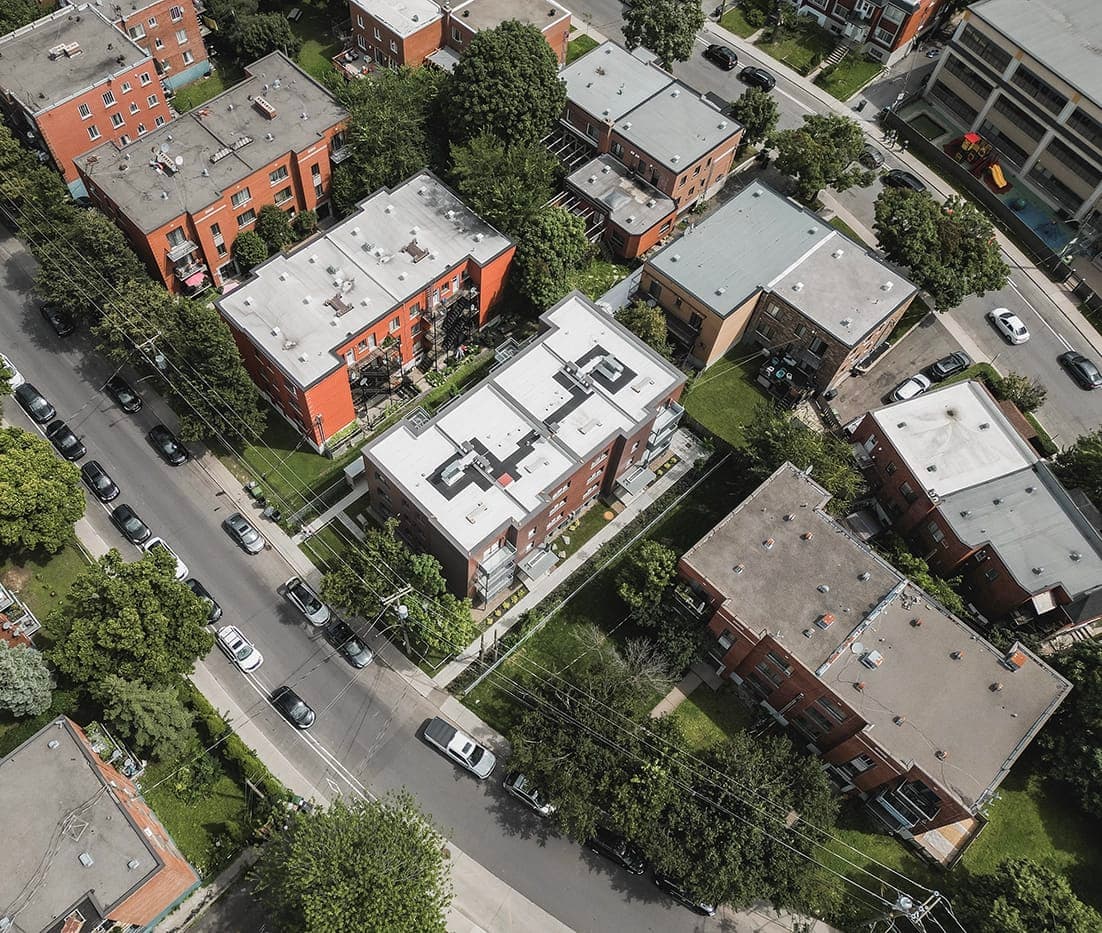Aerial view of brick residential buildings